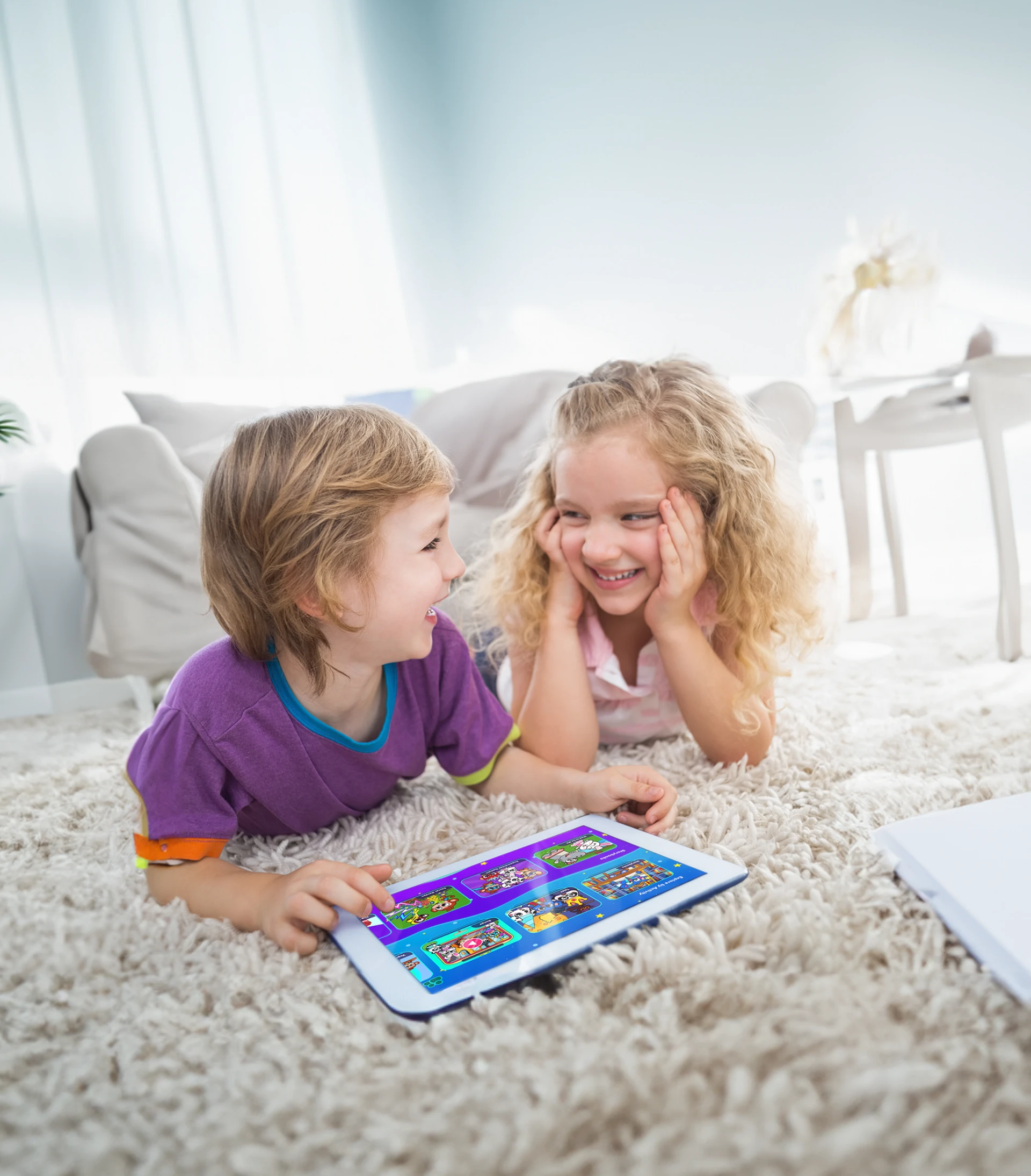 Two children playing Tiny Minies together on a tablet